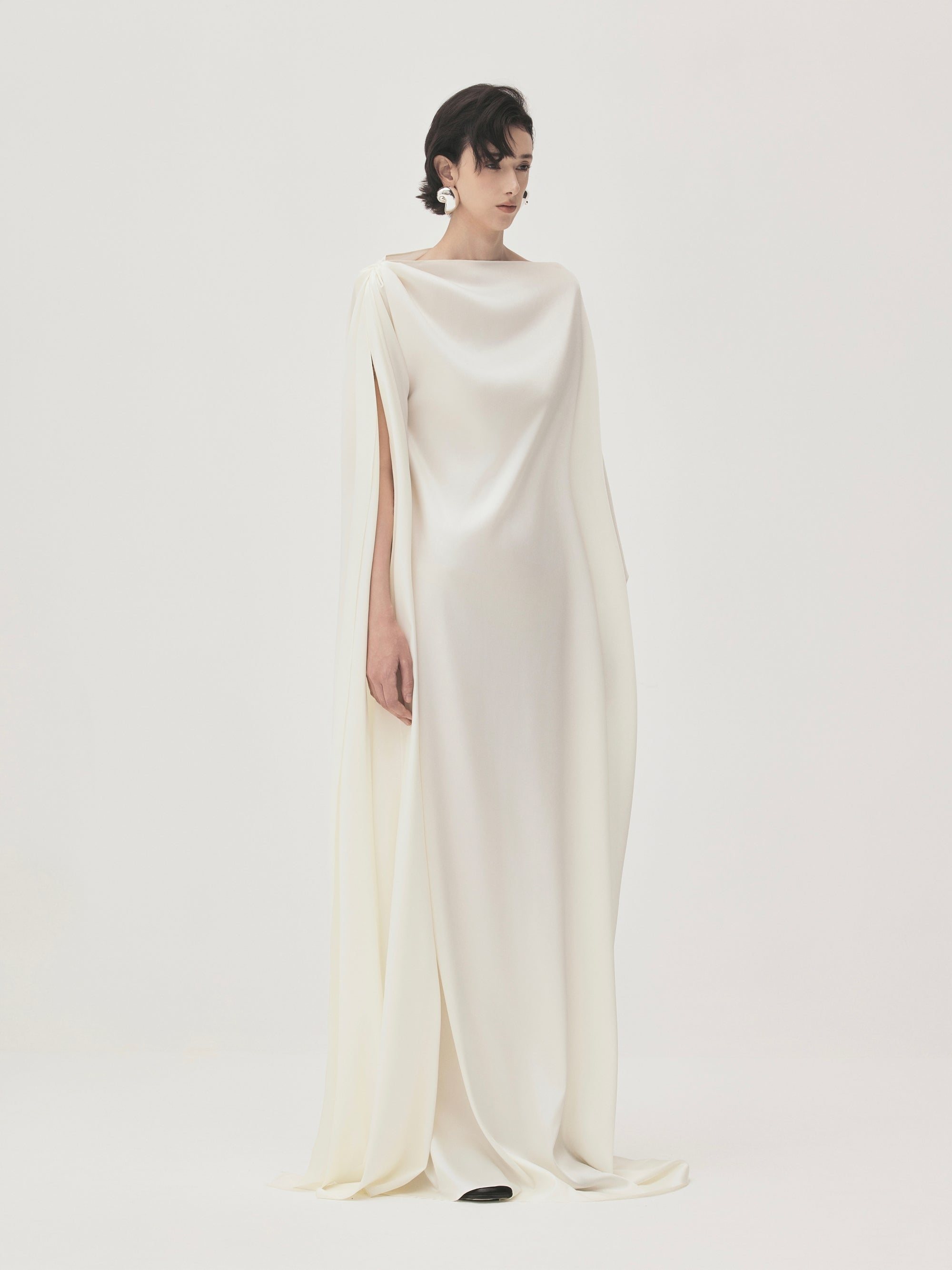 Quyen Trapezoid Shoulder Draping Boat Neck Satin Maxi Dress